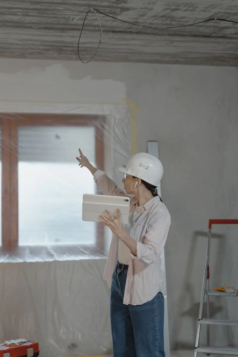 Inspector overseeing a renovation on site